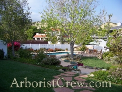 Professionally landscaped home in Camarillo features a fieldstone walkway.