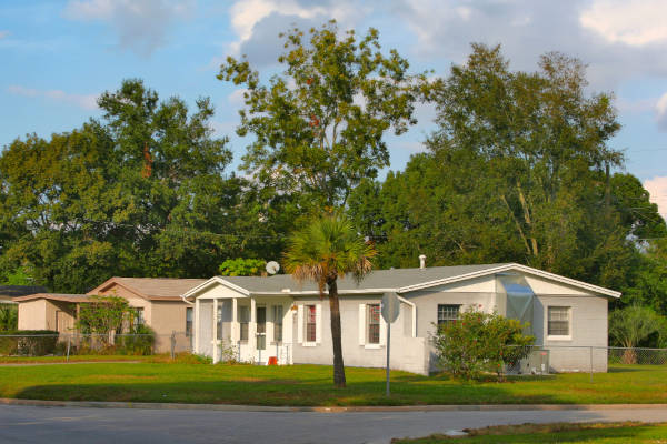 A picturesque scene of a residential neighborhood featuring a single-story house.